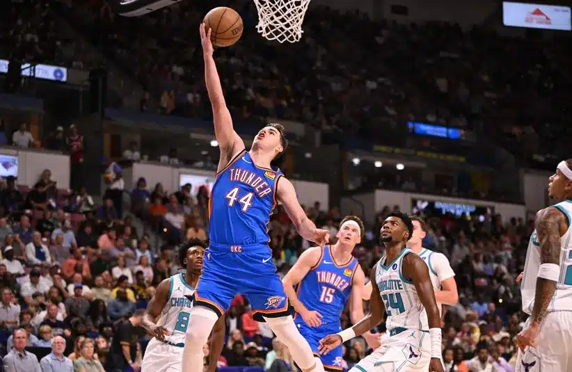 Oklahoma City Thunder guard Nikola Topic (44) lays up a shot against the Charlotte Hornets