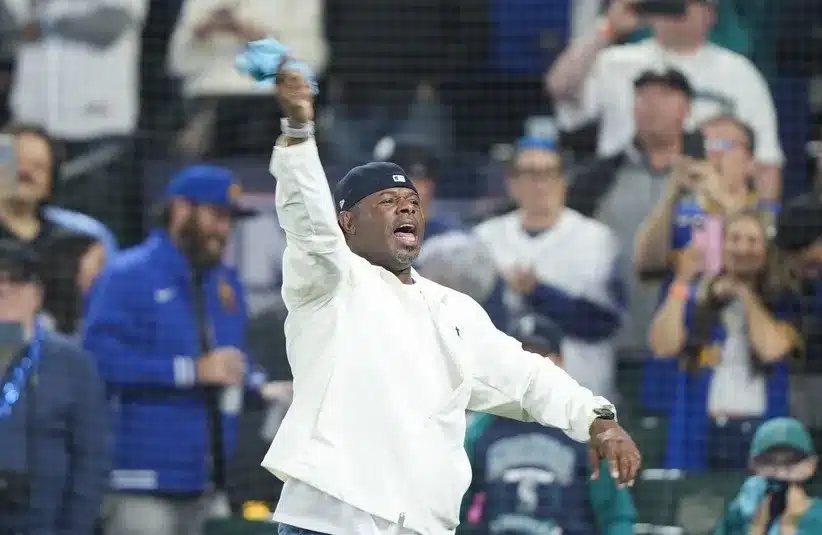 Seattle Mariners former player Ken Griffey Jr. cheers prior to game five of the ALDS
