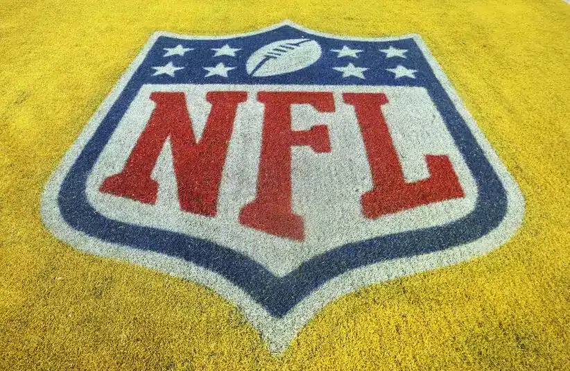 NFL shield logo. Tony Romo