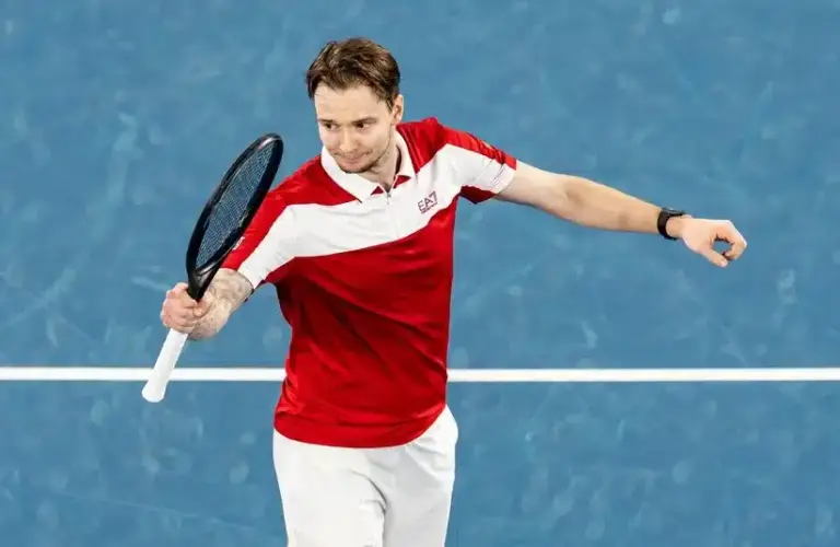 Bublik celebrates winning a point