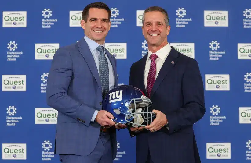 Giants GM Joe Schoen and Head Coach John Harbaugh Posing For Photo With Giants Helmet