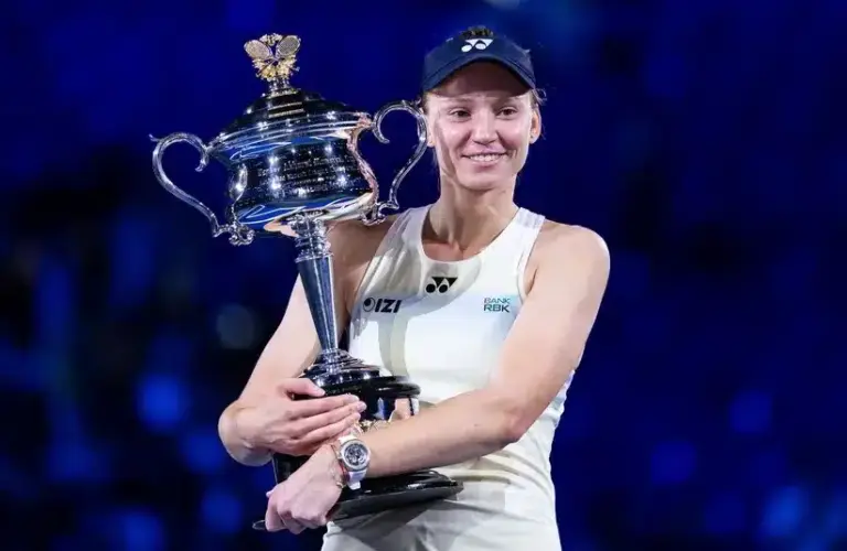 Elena Rybakina of Kazakhstan with the Daphne Akhurst Memorial Cup after her victory over Aryna Sabalenka in the final of the womenís singles at the Australian Open at Rod Laver Arena in Melbourne Park