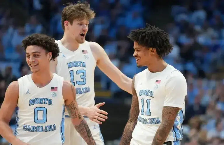 UNC Tar Heels guard Kyan Evans (0) and center Henri Veesaar (13) and forward Jonathan Powell (11) react in the first half at Dean E. Smith Center. North Carolina University