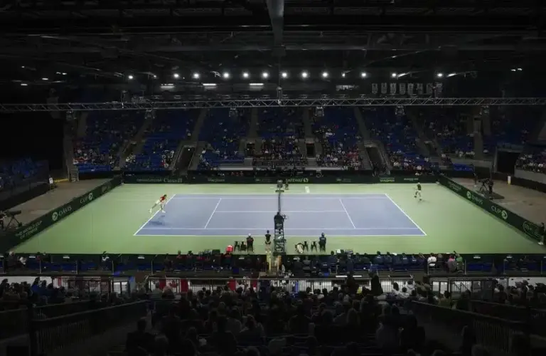 Brunold with tennis court view