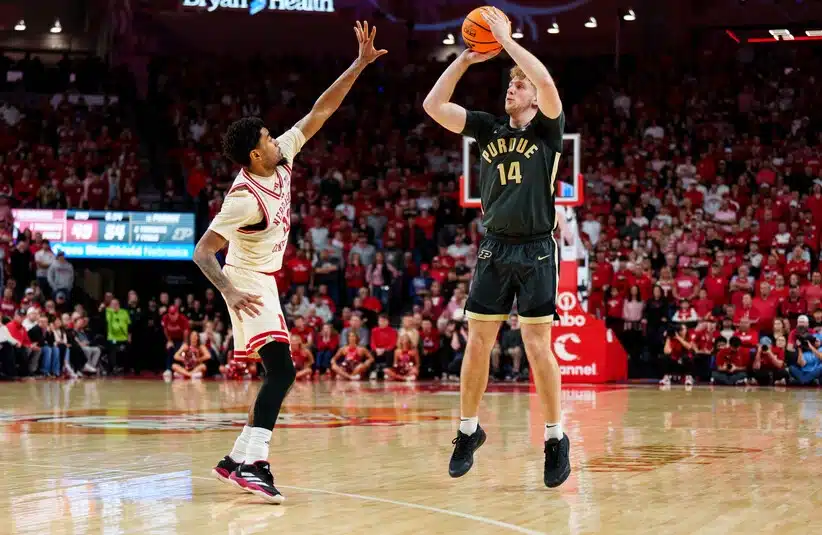 Purdue player shoots a shot against Nebraska.