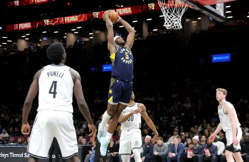 Jarace Walker attempting a dunk on the Nets.