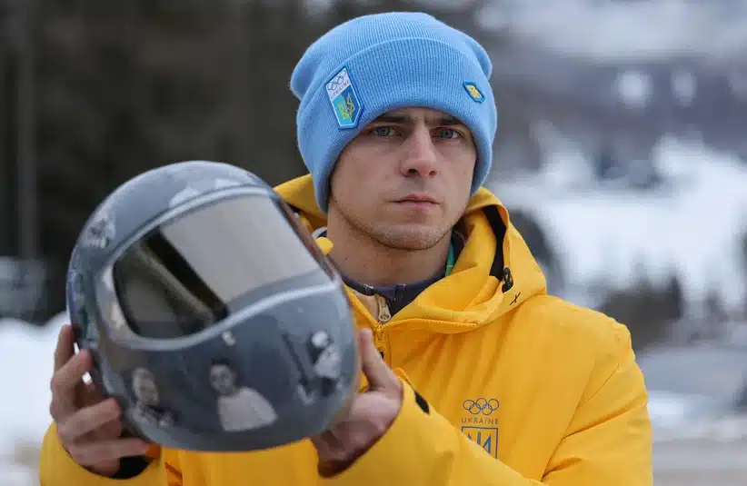 Vladyslav Heraskevych showing the helmet.