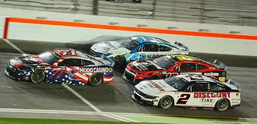 Daytona; Michael McDowell (71), Austin Cindric (2), Ty Dillon (10) and Erik Jones (43) speed through the high banks during the the NASCAR Cup Series Duel during Speedweek, Thursday, Feb. 12, 2026.