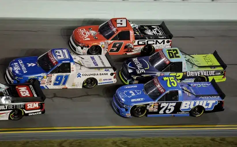 Atlanta; Feb 13, 2026; Daytona Beach, Florida, USA; NASCAR Truck Series driver Christian Eckes (91) races Grant Enfinger (9), John Hunter Nemecheck (62) and Corey Lajoie (75) during the Craftsman Truck series Fresh From Florida 250 at Daytona International Speedway.