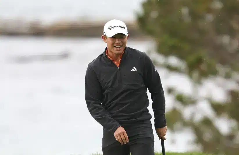 Collin Morikawa reacts after missing his putt on the fourth hole