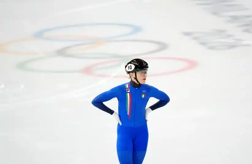 Fontana with her hands on her hips