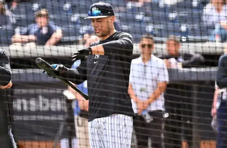 New York Yankees outfielder Giancarlo Stanton (27) prepares for batting practice