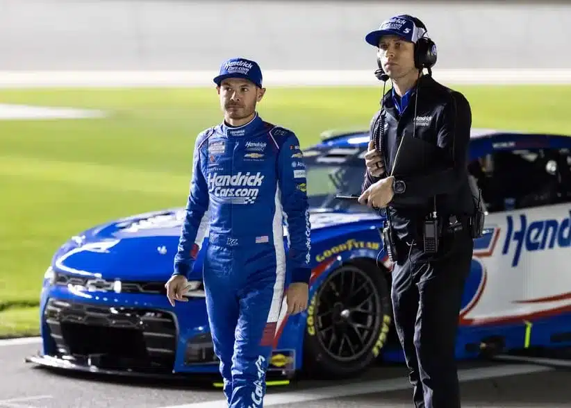 Feb 11, 2026; Daytona Beach, Florida, USA; NASCAR Cup Series driver Kyle Larson (left) with crew chief Cliff Daniels during qualifying for the Daytona 500 at Daytona International Speedway.