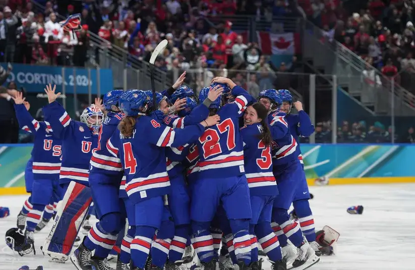 Team USA celebrates winning the Gold Medal in Women’s ice hockey against Canada in overtime of the women's ice hockey gold medal game during the Milano Cortina 2026 Olympic Winter Games, February 19.