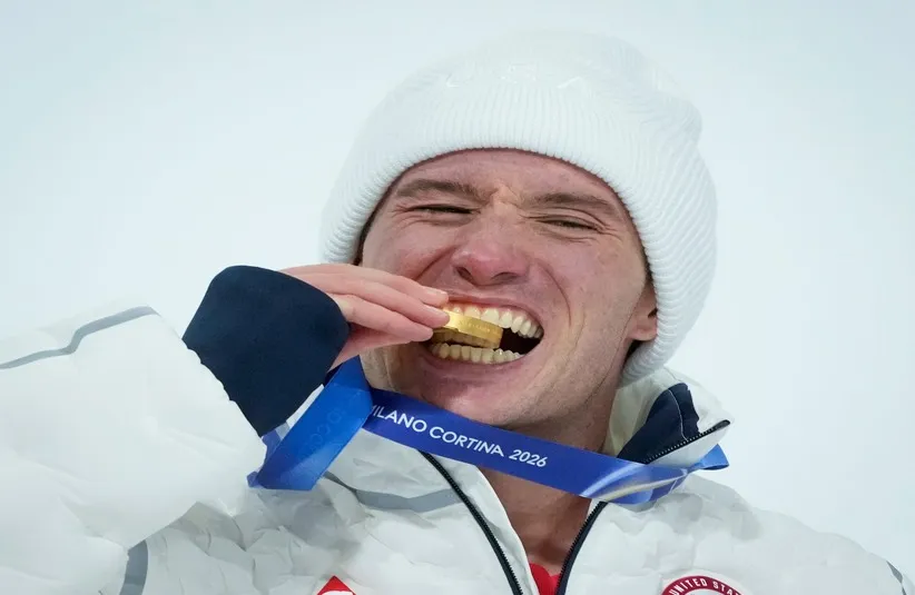 Alex Ferreira celebrates winning gold medal in the men's freestyle skiing halfpipe finals during the Milano Cortina 2026 Olympic Winter Games