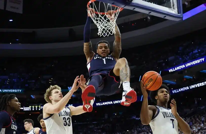 UConn Huskies guard Solo Ball (1) dunks the ball against the Villanova Wildcats