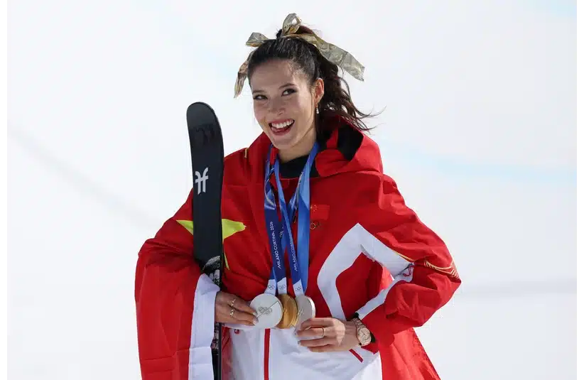 Eileen Gu showcasing her medals after the Halfpipe Final on Sunday.