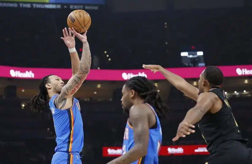 Oklahoma City Thunder forward Jaylin Williams (6) shoots a three point basket against the Cleveland Cavaliers