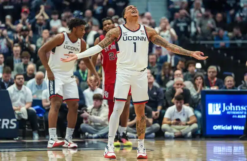 UConn Huskies guard Solo Ball (1) reacts to the crowd