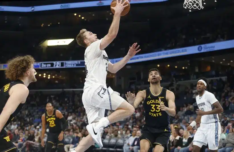 Memphis Grizzlies guard Cam Spencer (24) drives to the basket