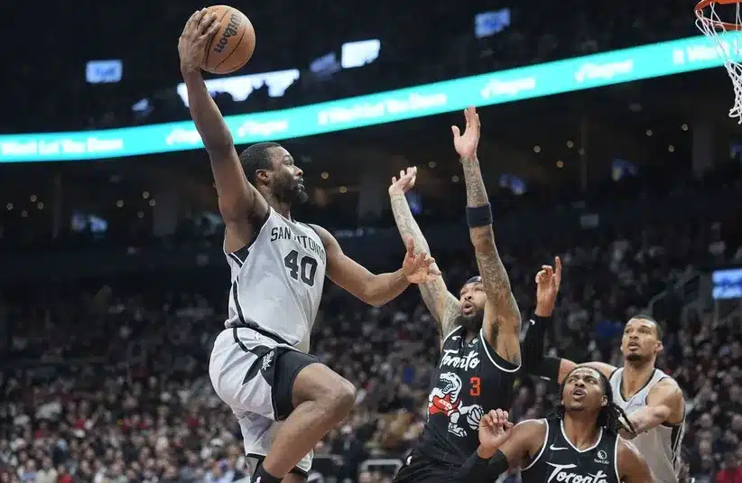 San Antonio Spurs forward Harrison Barnes (40) goes up to make a basket against Toronto Raptors forward Brandon Ingram