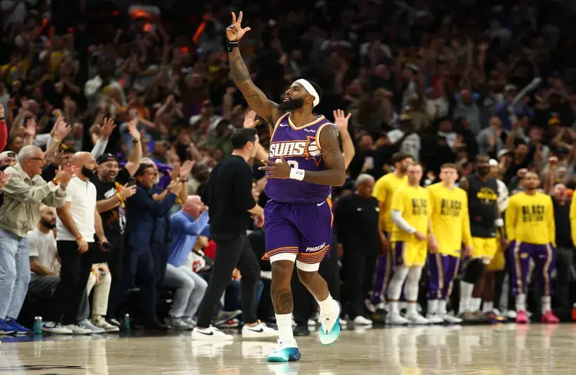 Phoenix Suns forward Royce O'Neale (00) celebrates the game winning shot against the Los Angeles Lakers in the second half.