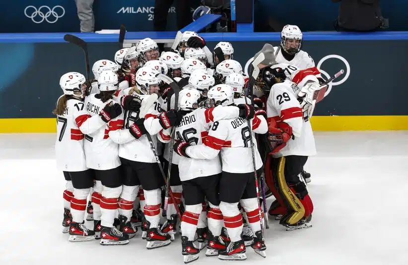 February 6, 2026, Milan, ITALY; Ivana Wey of Switzerland celebrates with teammates after scoring the winning penalty shootout goal against Czech Republic in women's ice hockey Group A play during the Milano Cortina 2026 Olympic Winter Games at Milano Santa Giulia Ice Hockey Arena.