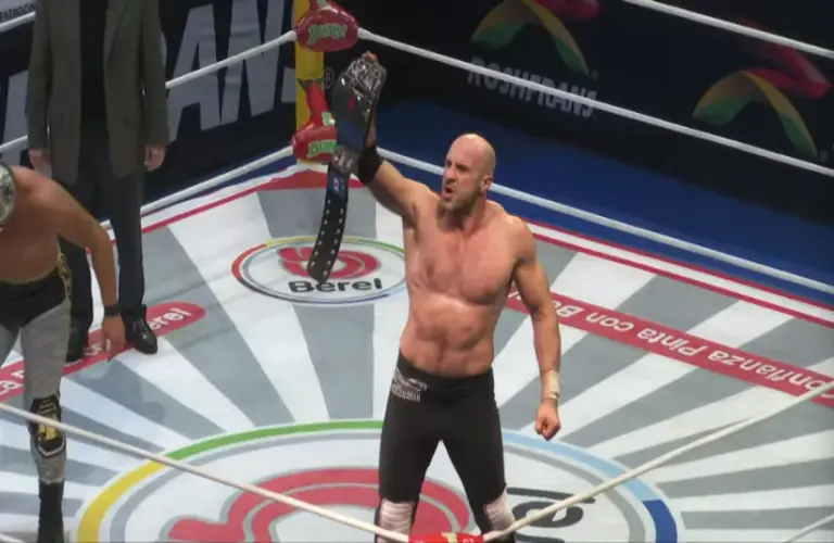 Claudio Castagnoli Raising The CMLL Heavyweight Championship