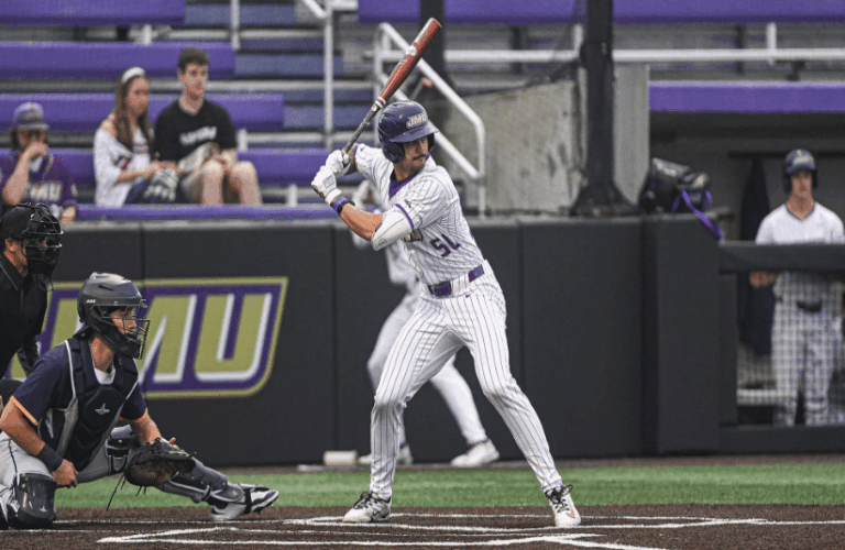 Josiah Seguin of James Madison Trying to hit on March 29.