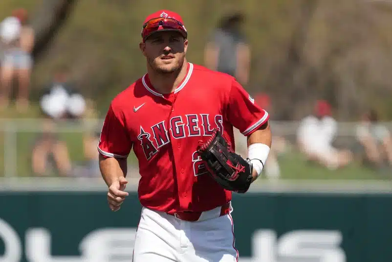 Mar 10, 2026; Tempe, Arizona, USA; Los Angeles Angels right fielder Mike Trout (27) runs from the outfield against the San Diego Padres in the first inning at Tempe Diablo Stadium.