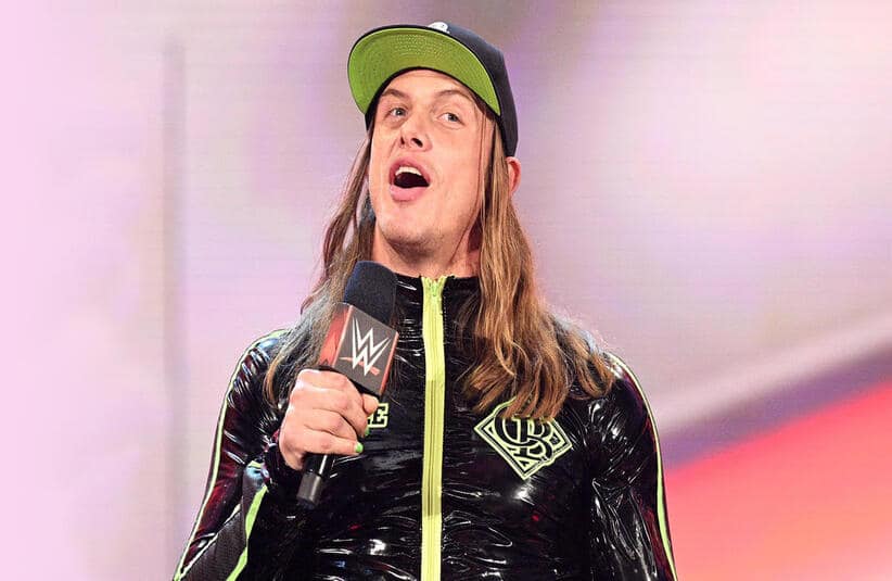 Matt Riddle Holding A WWE Microphone Cutting A Promo