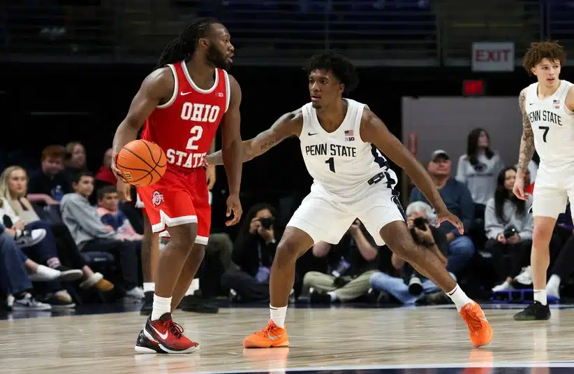 Mar 4, 2026; University Park, Pennsylvania, USA; Ohio State Buckeyes guard Bruce Thornton (2) looks to pass the ball as Penn State Nittany Lions forward Mason Blackwood (1) defends during the second half at Bryce Jordan Center.