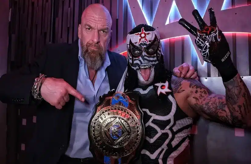 Triple H Posing For Photo With Penta Holding The Intercontinental Championship