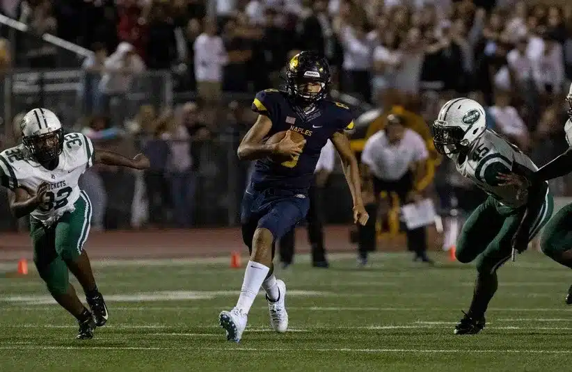 Naples High School's Dominiq Ponder runs the ball