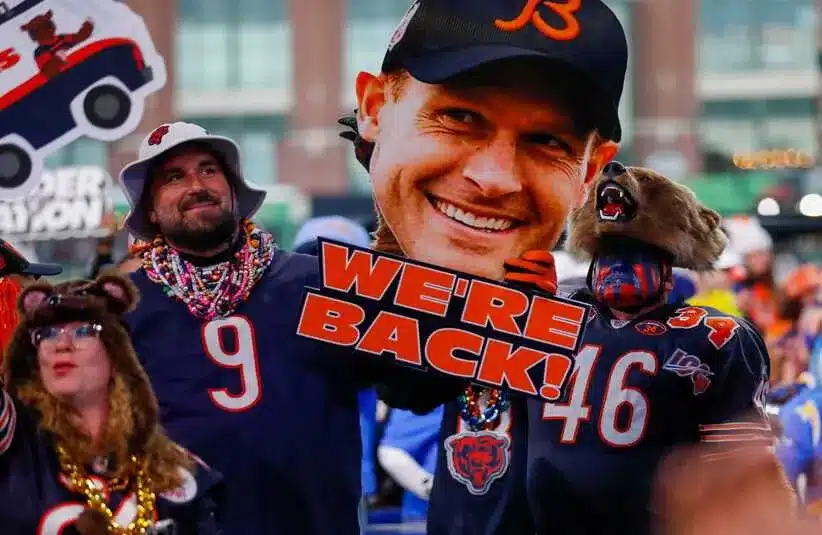 Chicago Bears fans hold up a sign before the first round of the 2025 NFL Draft
