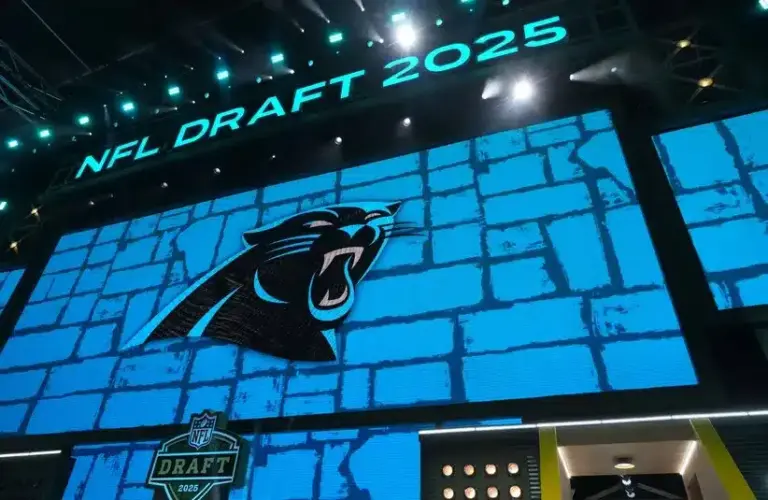 The Carolina Panthers logo is projected on the video board during the 2025 NFL Draft
