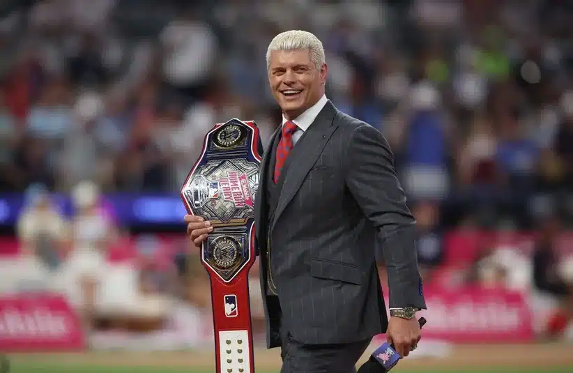 Cody Rhodes holding the belt