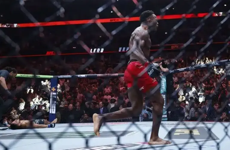 Lerone Murphy (red gloves) reacts after the fight against Aaron Pico (blue gloves)