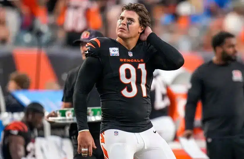 Cincinnati Bengals defensive end Trey Hendrickson (91) watches a replay as the Detroit Lions celebrate a touchdown in the fourth quarter