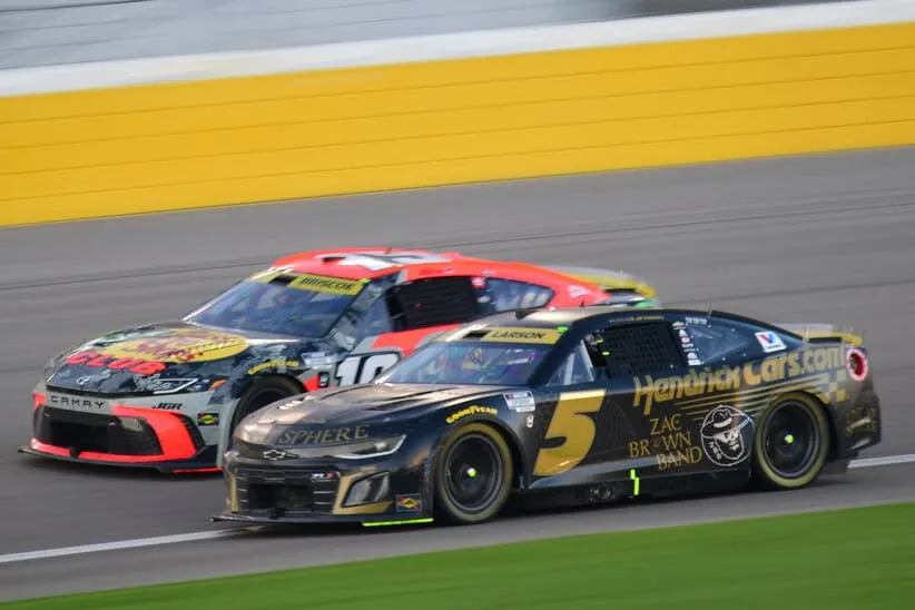Power Rankings; Oct 12, 2025; Las Vegas, Nevada, USA; NASCAR Cup Series driver Kyle Larson (5) and driver Chase Briscoe (19) drive for position during the South Point 400 at Las Vegas Motor Speedway.