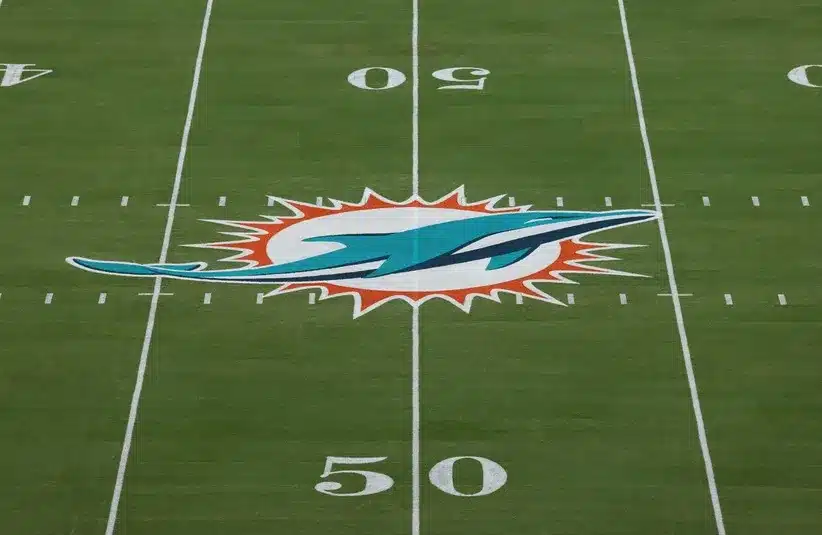 The Miami Dolphins logo is seen at midfield