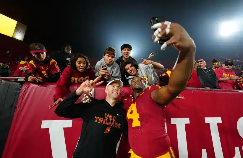 Lincoln Riley Posing For Photo With USC Jahkeem Stewart