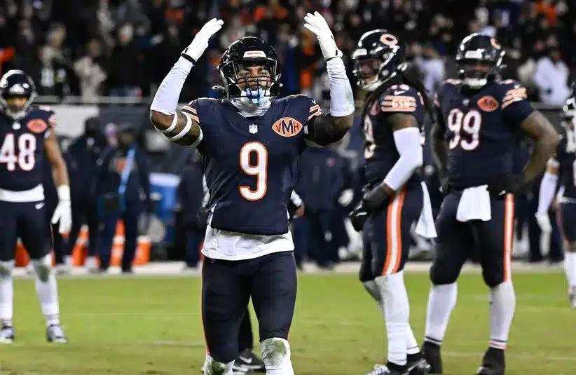 Chicago Bears safety Jaquan Brisker (9) reacts after a flag