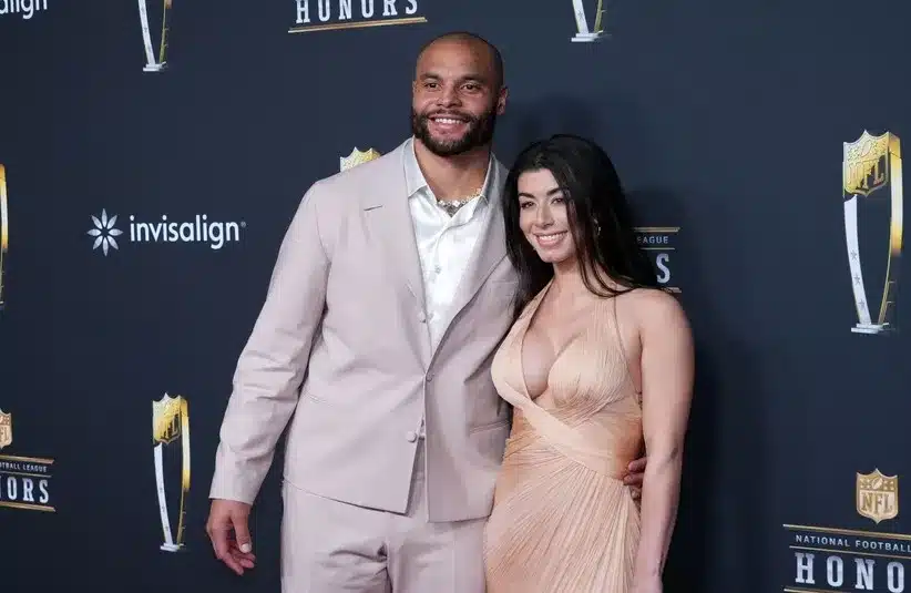 Dallas Cowboys quarterback Dak Prescott and wife Sarah Jane Ramos pose on the NFL Honors Red Carpet