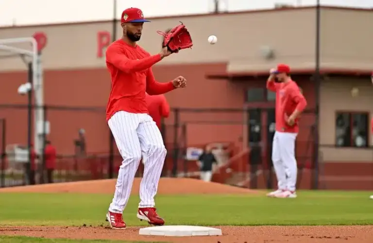 Philadelphia Phillies pitcher Cristopher Sanchez (61) runs a drill during spring training