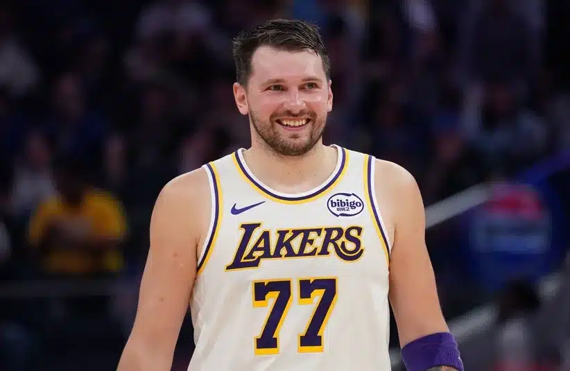 Doncic smiling at his teammate
