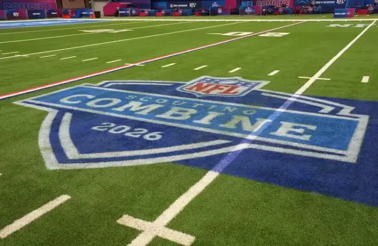 NFL Combine logo on the field inside of Lucas Oil Stadium.