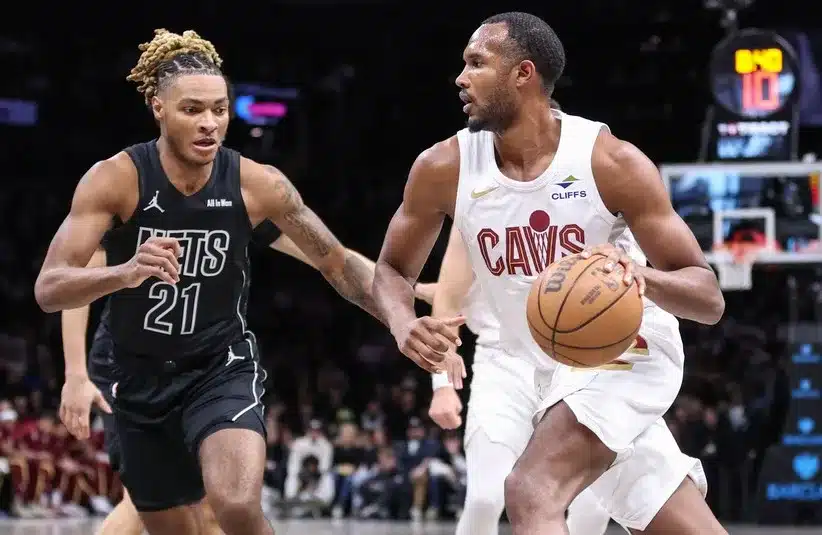 Cleveland Cavaliers center Evan Mobley (4) looks to drive