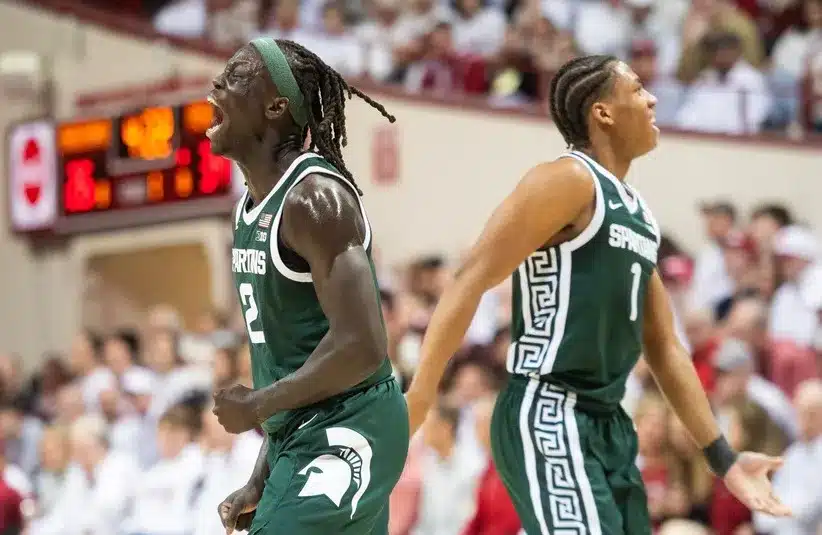 Michigan State's Kur Teng (2) and Jeremy Fears Jr. (1) celebrate