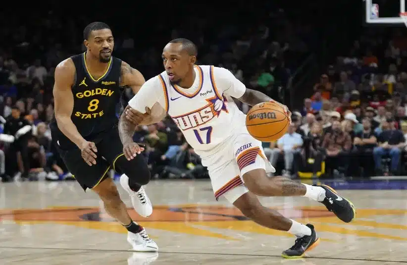 Suns guard Jamaree Bouyea (17) drives to the hoop.
